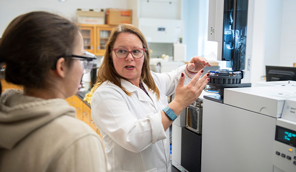 Professor and student in science laboratory