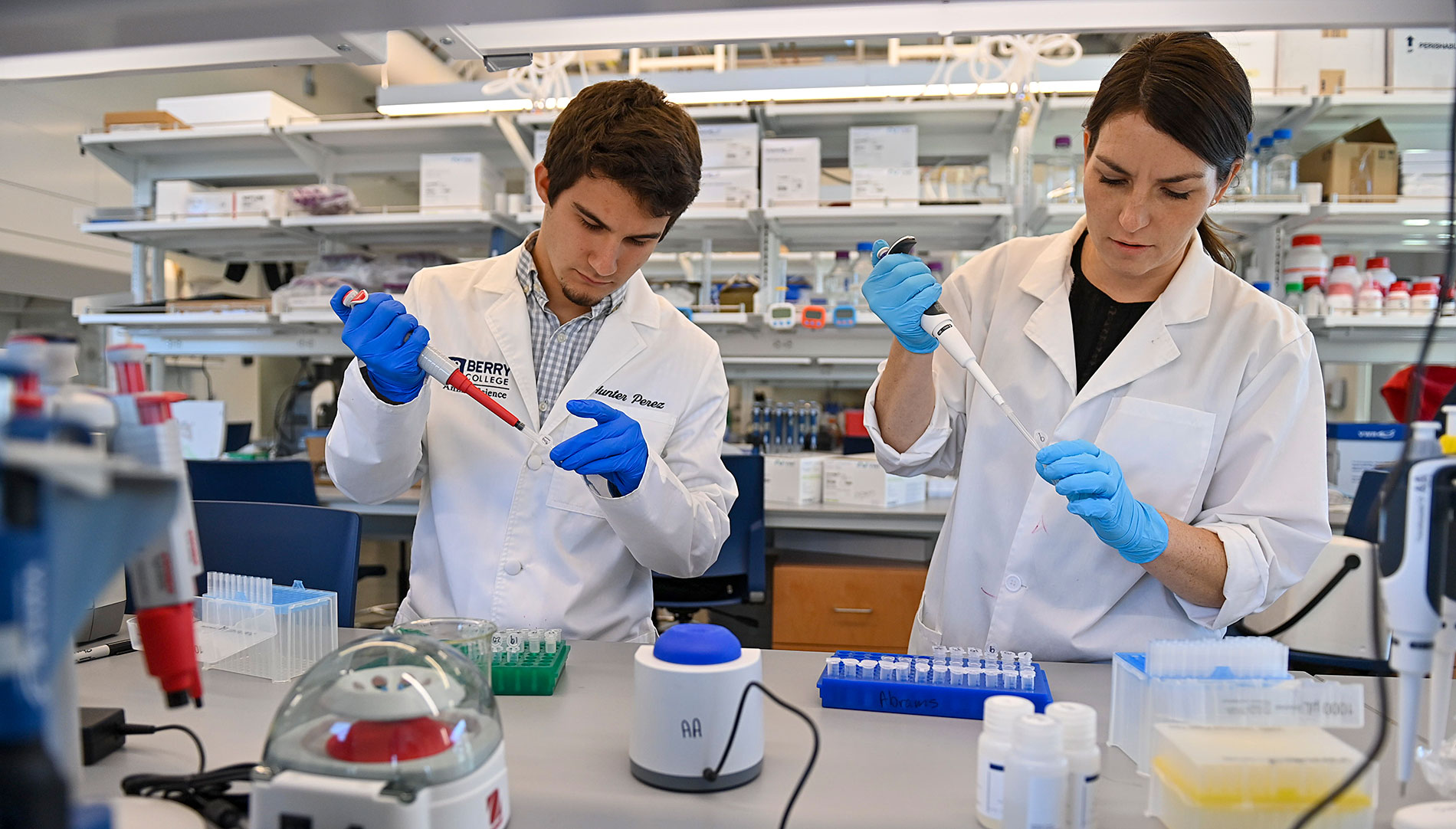 Student doing research with professor in lab